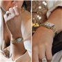 boîtier en alliage doré et bracelet avec pierres et cadran blanc