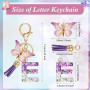 JSRQT Porte-clés Lettre Initiale, Porte-clés Alphabet en Résine Violettes pour Femme Filles avec Pendentif Papillon et Pompon, S
